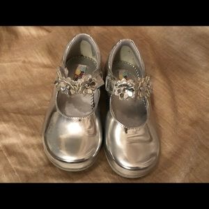 Girls silver Mary-jane dress shoes.